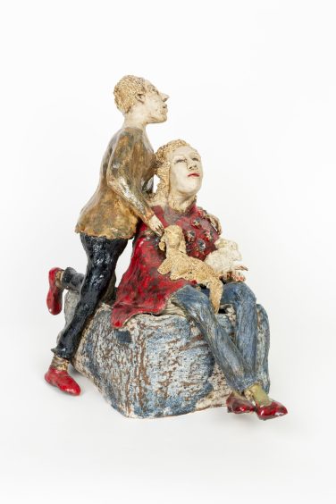 Paar mit roten Schuhen