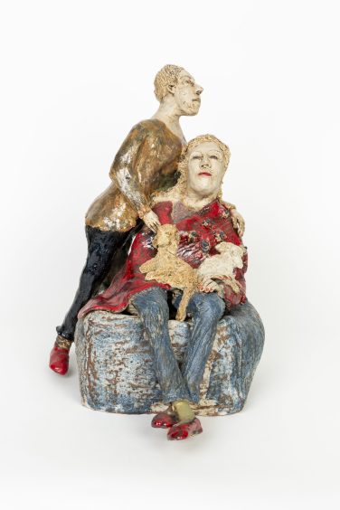 Paar mit roten Schuhen