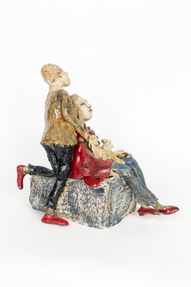 Paar mit roten Schuhen